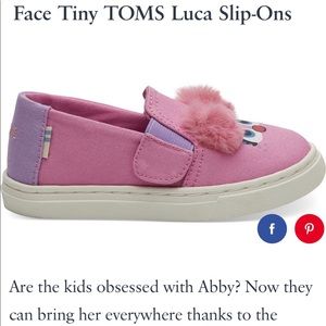 Toms pink Abby face slip-ons